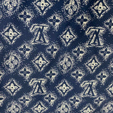 Flat lay presentation of Louis Vuitton luxury clothing with everyday silhouette