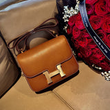  Clean-Lined handbag carried on shoulder