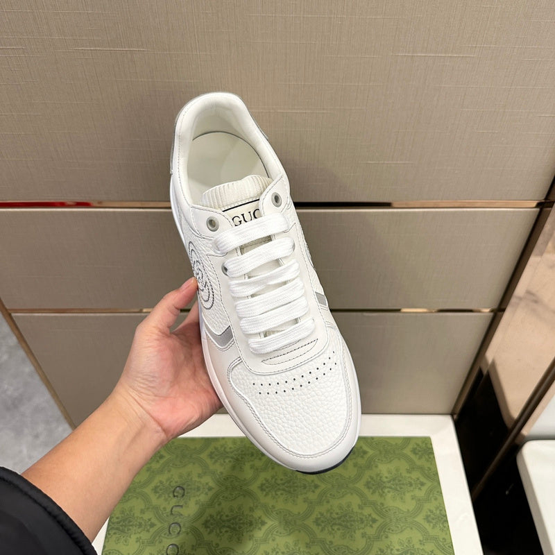 Side profile of Gucci neutral cream sneakers minimalist modern build