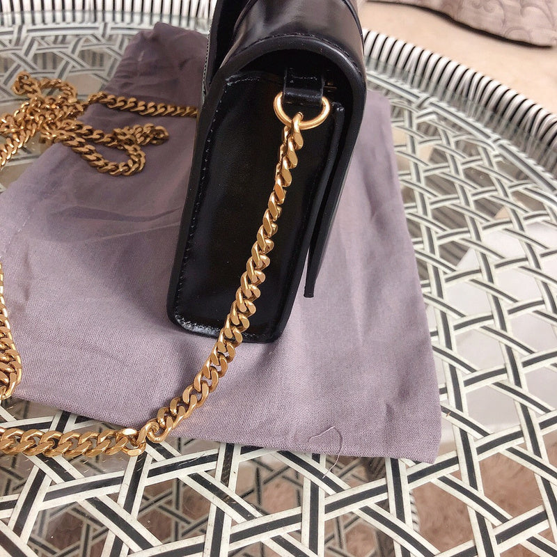 Handle and strap detail of statement classic women's handbag – women's luxury handbag