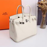 Side view of versatile structured handbag