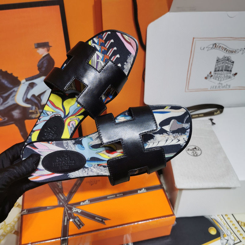 Hermes sandals Style 024 - close-up of classic monogram styling