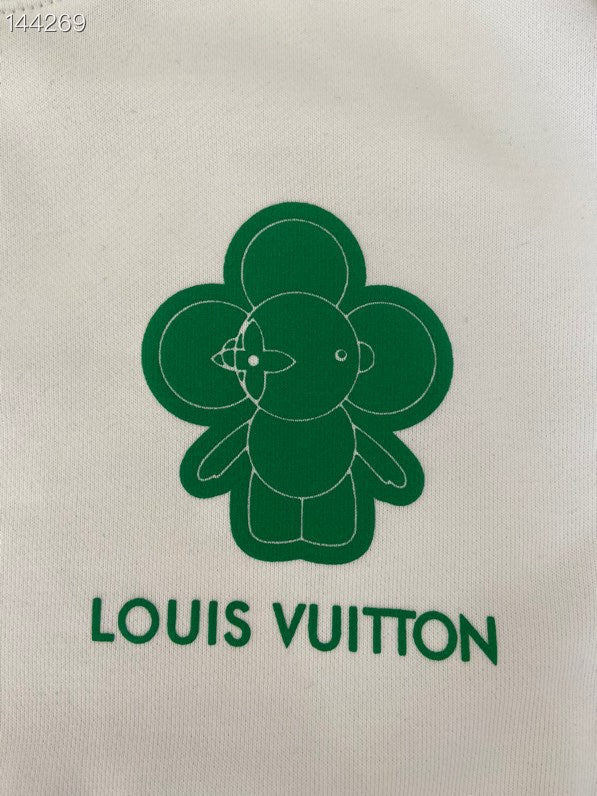 Close-up detail shot of Louis Vuitton luxury clothing with everyday silhouette