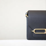  Understated crossbody bag carried on shoulder 10
