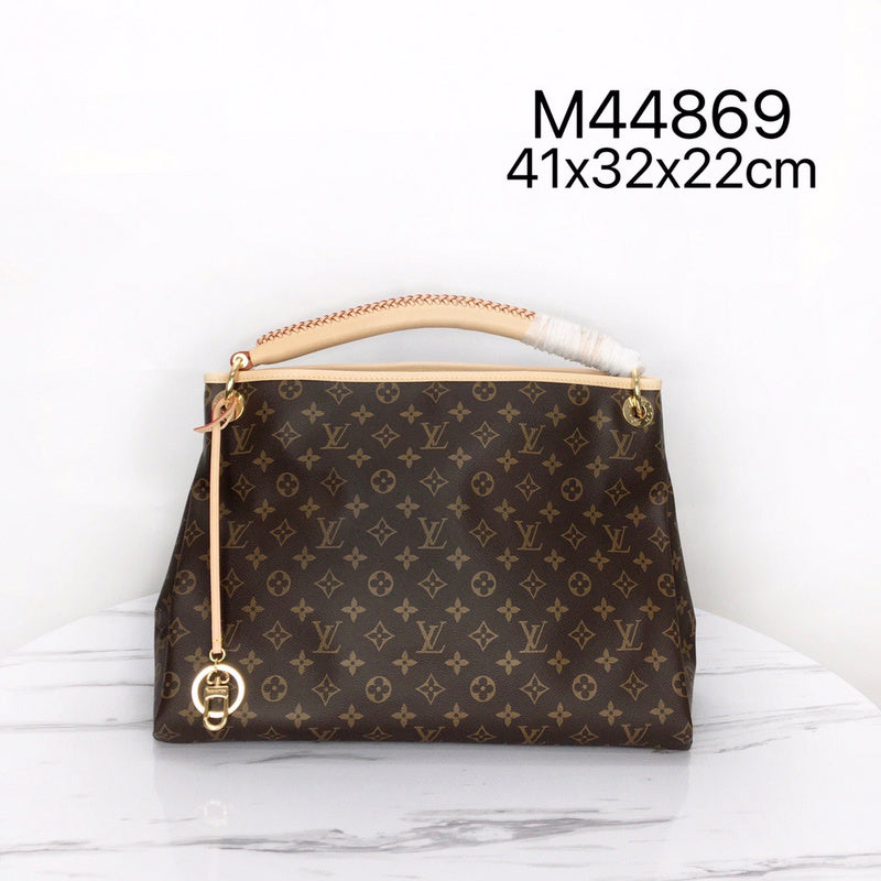 Side profile of modern statement women's handbag – women's luxury accessory