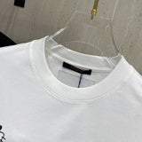 Full styled look of Louis Vuitton cotton t-shirt with streetwear-inspired cut