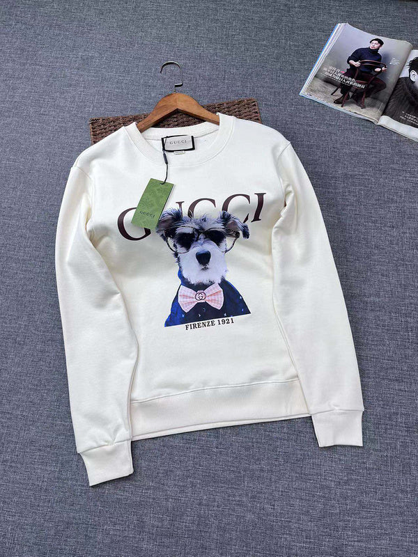 Front view of Gucci luxury clothing with signature branding