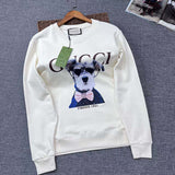 Front view of Gucci luxury clothing with signature branding