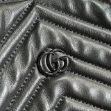 Back view of refined chic women's handbag – women's statement bag