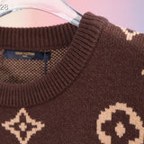 Flat lay presentation of Louis Vuitton luxury clothing with runway-inspired design