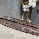 Side view of fluid structured handbag