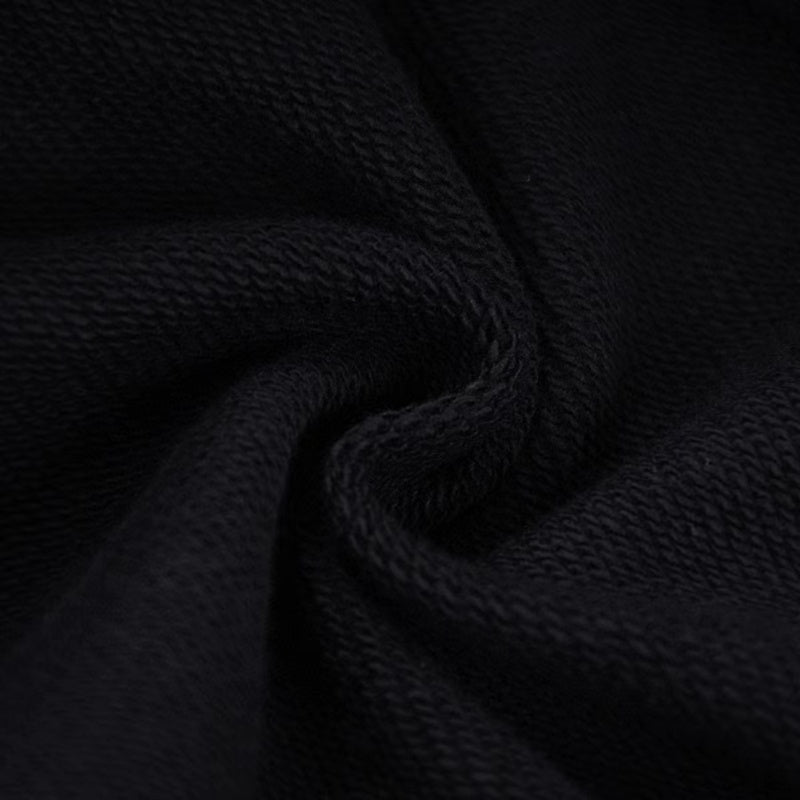 Flat lay presentation of Louis Vuitton luxury clothing with signature branding