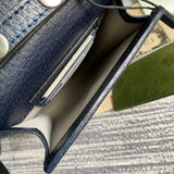 Close-up detail of statement polished women's handbag – women's designer-style accessory