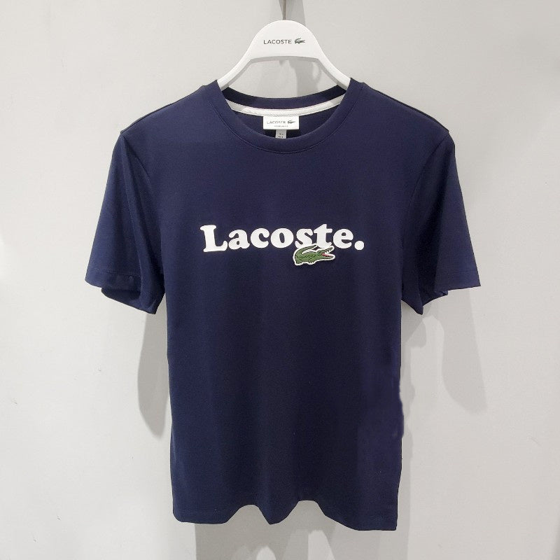 Front view of Lacoste luxury clothing with signature branding
