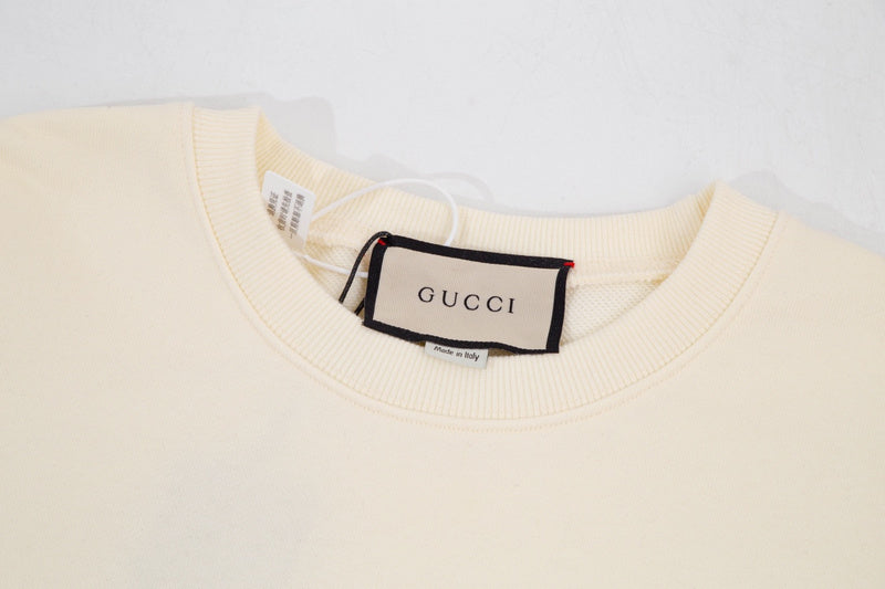Close-up detail shot of Gucci luxury clothing with contemporary cut