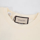 Close-up detail shot of Gucci luxury clothing with contemporary cut