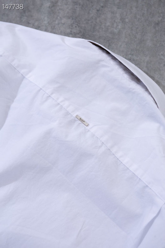 Side profile of Louis Vuitton luxury clothing with monogram-inspired silhouette