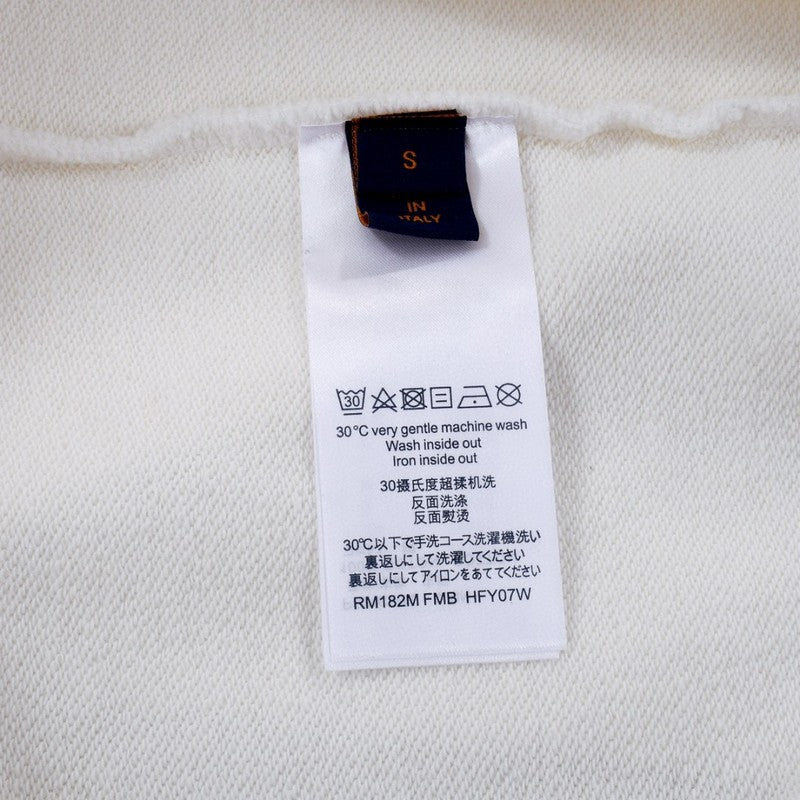 Back view of Louis Vuitton luxury clothing with tailored silhouette