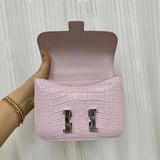  streamlined shoulder bag styled with outfit