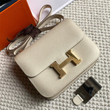 Side view of streamlined structured handbag