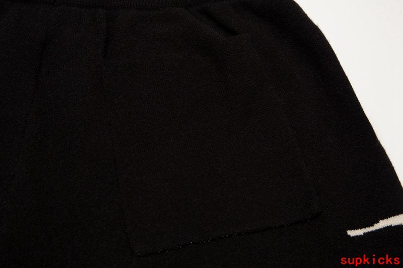 Close-up detail shot of Rhude luxury clothing with runway-inspired design