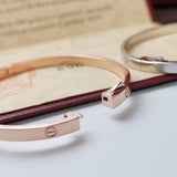Close-up detail view of Cartier unisex jewelry piece