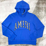 Close-up detail view of Amiri luxury piece style No.033