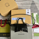 Modern Faux Leather Handbag - Signature Hardware Accents | Women's Premium Handbag #290 - side angle view (image 2) of designer-inspired handbag