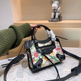Ziva's Charm handbag – styled view (one versatile size)