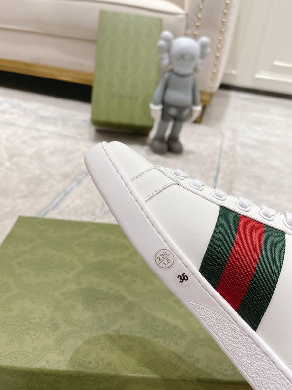Side profile of Gucci clean off-white sneakers padded collar comfort