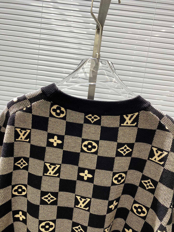 Flat lay presentation of Louis Vuitton luxury clothing with contemporary cut