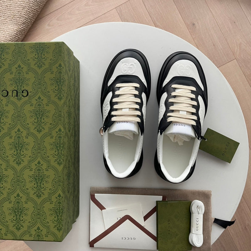 Side profile of Gucci stone beige sneakers bold athletic profile