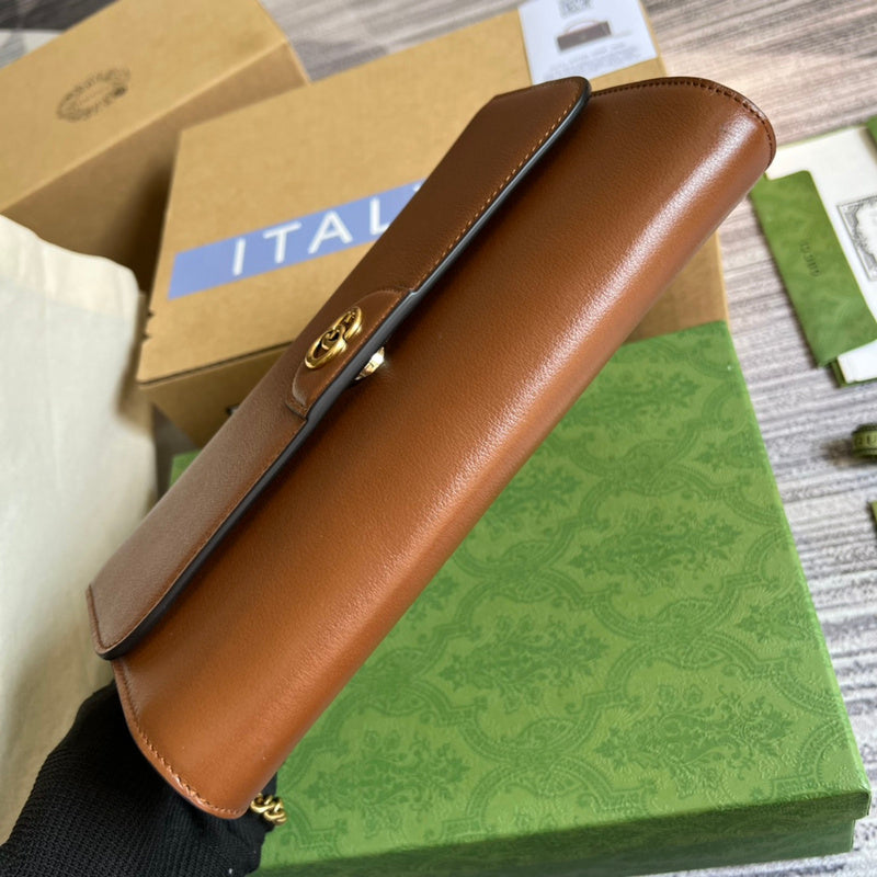 Side profile of everyday-luxe structured women's handbag – women's luxury accessory