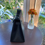  Sleek carryall bag carried on shoulder