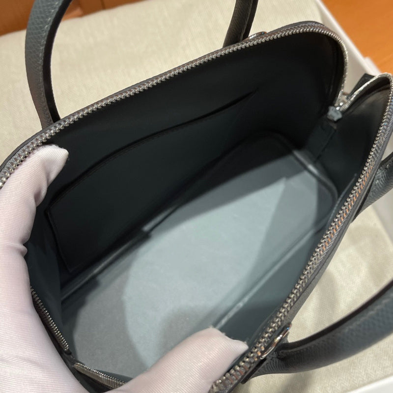 Side view of statement structured handbag