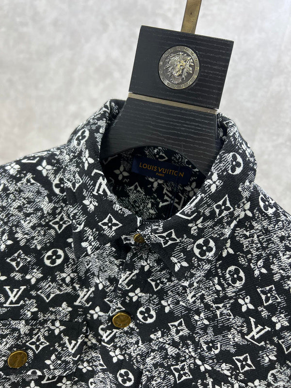 Full styled look of Louis Vuitton luxury clothing with label-forward styling