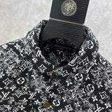 Full styled look of Louis Vuitton luxury clothing with label-forward styling