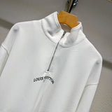 Close-up detail shot of Louis Vuitton luxury clothing with monogram-inspired silhouette