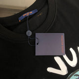 Full styled look of Louis Vuitton cotton t-shirt with label-forward styling