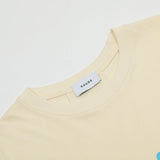 Side profile of Rhude luxury clothing with signature branding
