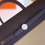  polished crossbody bag detail view showing craftsmanship 32