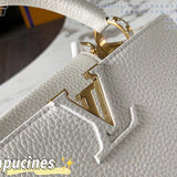 Styled lifestyle shot of structured refined women's handbag – women's designer-style accessory