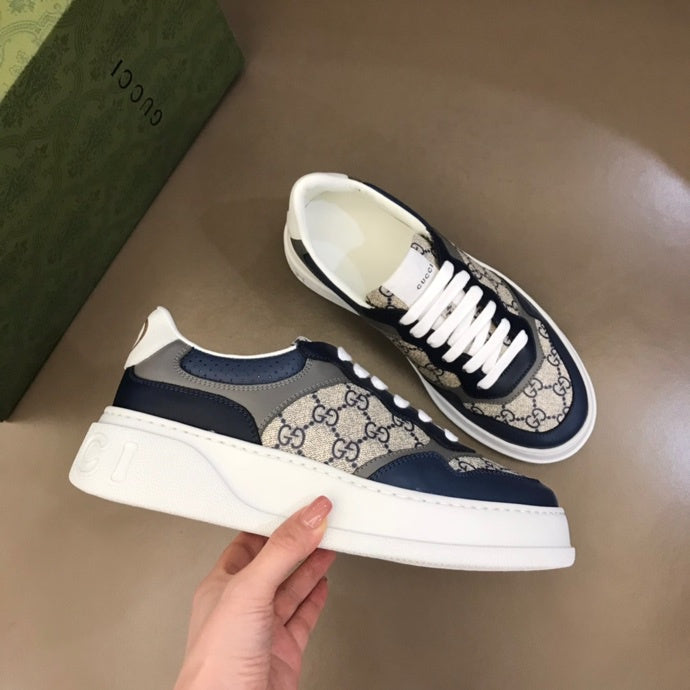 Gucci Designer sneakers in bold contrast streetwear statement look front view