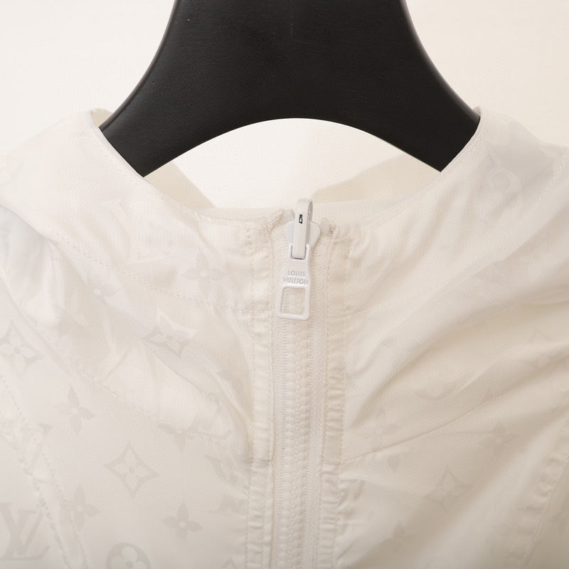 Side profile of Louis Vuitton luxury clothing with logo-detail design