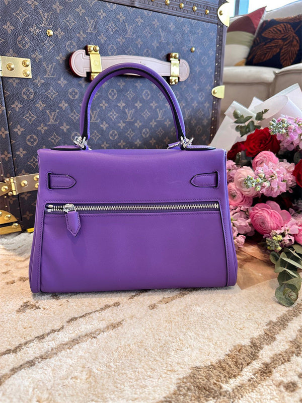 Side view of streamlined structured handbag