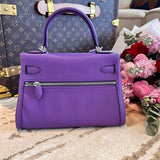 Side view of streamlined structured handbag