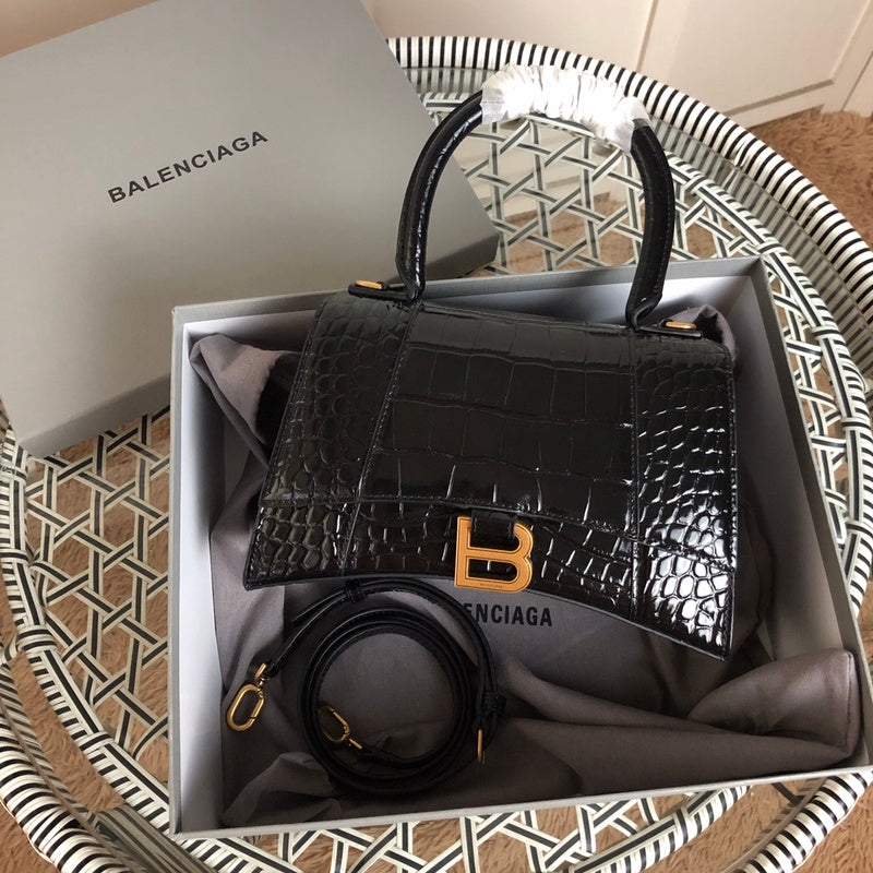 Front view of classic sleek women's handbag – women's luxury accessory