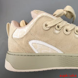 Dior shoes Style 020 - close-up of iconic logo design (alternate angle)