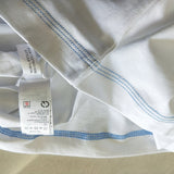 Close-up detail shot of Lacoste luxury clothing with tailored silhouette