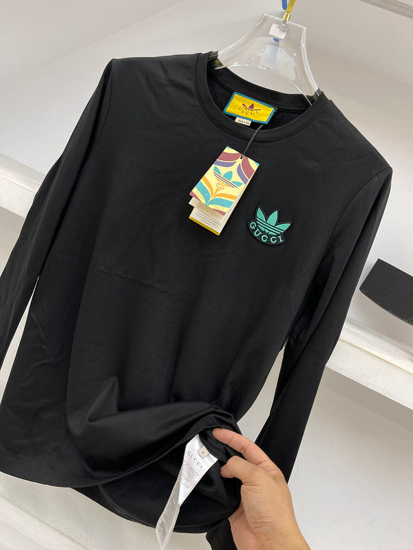 Front view of Gucci luxury clothing with logo-detail design